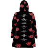 Back view of red cloud print cloak with white village symbol column down the spine