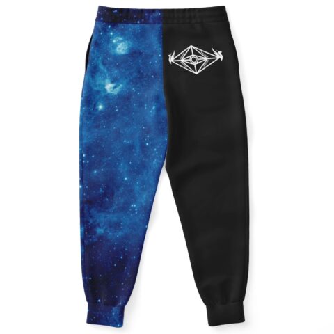Split black and galaxy print joggers with geometric eye emblem on back pocket, flat lay