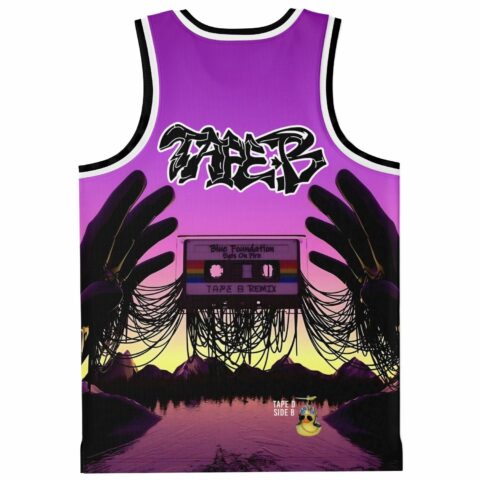 Back view of graffiti-style Tape B lettering above cassette and mountain lake print with sunglasses