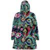 Rave cloak back view showing teal foliage and eyeball floral print with hood