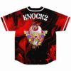 Back view of red black psychedelic jersey with KNOCK2 text and cartoon mushroom character graphic
