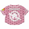Back view of the pink rave cropped baseball jersey with bold text and a graphic emblem