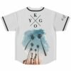 White jersey back with cross logo and silhouette head palm tree sunset graphic below collar