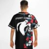 Man modeling Spooky Signals baseball jersey back view showing ghost graphic and floral half panel
