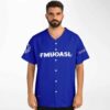 Model wearing royal blue rave jersey featuring FMUOASL graphic and geometric emblem on sleeve