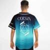 Model wearing festival-themed jersey back with geometric polyhedron graphic and forest ocean fade