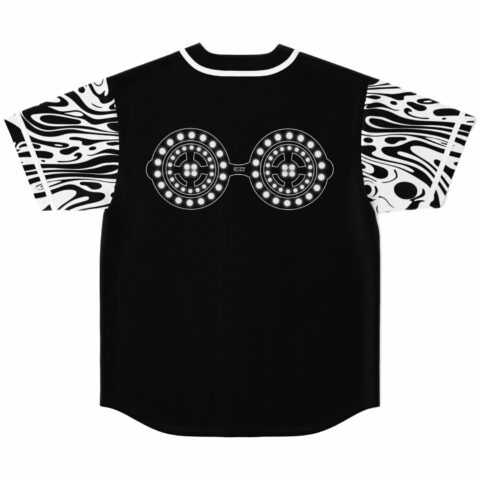 Black festival jersey back with bass-inspired goggle-eye graphic and swirl print sleeves, flat lay
