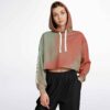 Front view of model wearing cropped hoodie with soft gradient