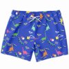 Royal blue rave swim trunks with retro dinosaur and geometric shapes print front view