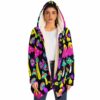 Model wearing psychedelic mushroom rave cloak with cream sherpa hood over white top