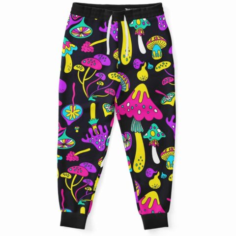 Neon psychedelic mushroom print joggers with pink and yellow fungi on black, front view