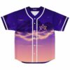 Photographic dusk jersey front view with purple-to-pink sky, clouds, white piping and geometric chest emblem