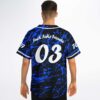 man modeling back of abstract paint splatter jersey with Fuck Fake Friends number 03