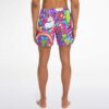 Back view on model shows neon candy collage with rainbows, lollipops, and bright dessert shapes