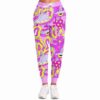 Pink lilac joggers featuring cartoon saucers and flowers, modeled from the front