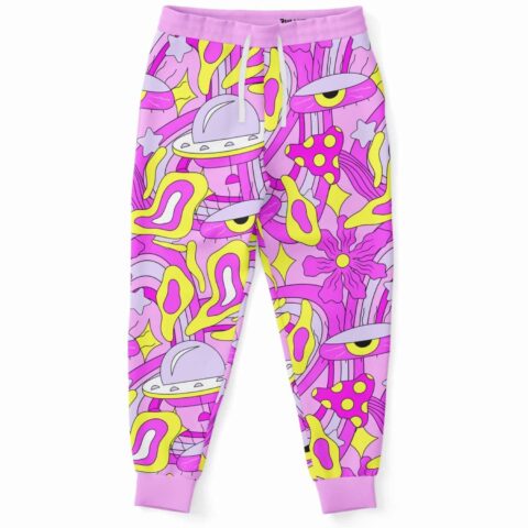 Pink lilac joggers with cartoon flying saucer pattern and eyes, front view on white