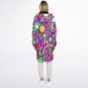 Rainbow candy collage cloak worn from behind, displaying the full hooded back panel on model