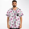 Man wearing pink sakura floral rave baseball jersey with black creature emblem