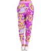 Cartoon flying saucer pattern with eyes and flowers on pink lilac joggers, back view modeled