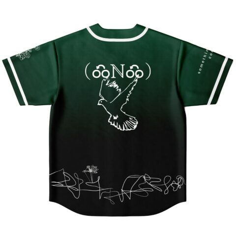 Reversible jersey back features a white flying bird emblem, cryptic lettering, and botanical linework
