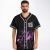 Model wearing black and purple fluid marble jersey with white piping and “GIRLS DONT NEED