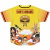 Yellow BOB’S BURGER cartoon food-scene jersey with burger graphic, back view on white background