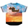 Sky-blue photographic sunset jersey with glowing clouds and black horizon, displayed in a back view