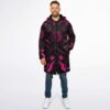 Front view of model wearing black cyber circuit cloak with vivid pink target graphics