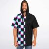 Model wearing hooded jersey with neon cyan-magenta checkerboard pattern, front view