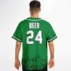 Back view of green festival jersey showing BEER 24 lettering, leafy cuffs, and mountain landscape