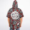 Model wearing red psychedelic swirl hooded jersey with large GOOD VIBES back graphic, rear view