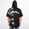 Model wearing black hooded jersey with eyeball creature print and CHEMONA text, rear view