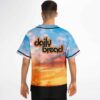 Model wearing sky-blue sunset jersey with starry clouds, button front, and bold black edging