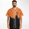 Orange starry sky design with fox mascot and black city skyline, worn front view