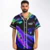 Black psychedelic iridescent swirl jersey with vivid neon marbling and white piping, straight-on modeled view