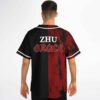 Black-red distressed split design with GRACE lettering, worn from the back by a festival model