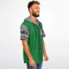 Green jersey with winged chest emblem, gray sleeves and hood, three-quarter festival apparel view