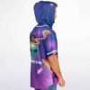 Alien galaxy print with rainbow orbit rings and “TRANSCEND” text, side view on model