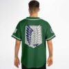 Model showcasing large winged shield emblem on forest green jersey, back view