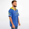 Royal blue festival jersey featuring a yellow hood, white trim, and angular energy emblem, modeled