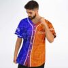 Front view of split geometric circuit pattern in blue and orange against white studio backdrop