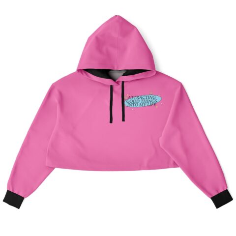 Front view of pink cropped hoodie with text design