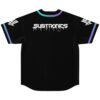 Black jersey back with dripping white festival logo and blue-purple sleeve trim, displayed against white