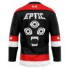 Back view of black occult graphic jersey featuring three eyes, fanged mouth, and red-white stripes
