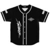 Black jersey front with white piping, geometric eye emblem, and vertical stylized wordmark
