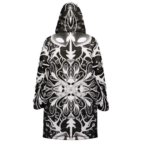Hooded cloak with black-and-white alien mandala pattern shown in back view
