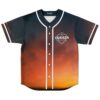 Sunset gradient cinematic sky jersey front with geometric emblem and white piping, studio product view