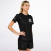 Side view of black paint splash smiley rave soccer jersey showing the script chest logo and sleeve lettering
