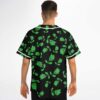Model shows the back of a black jersey covered in green creature and leaf motifs