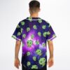 Model shows the back of a purple blue galaxy pattern covered in repeating kawaii dinosaurs